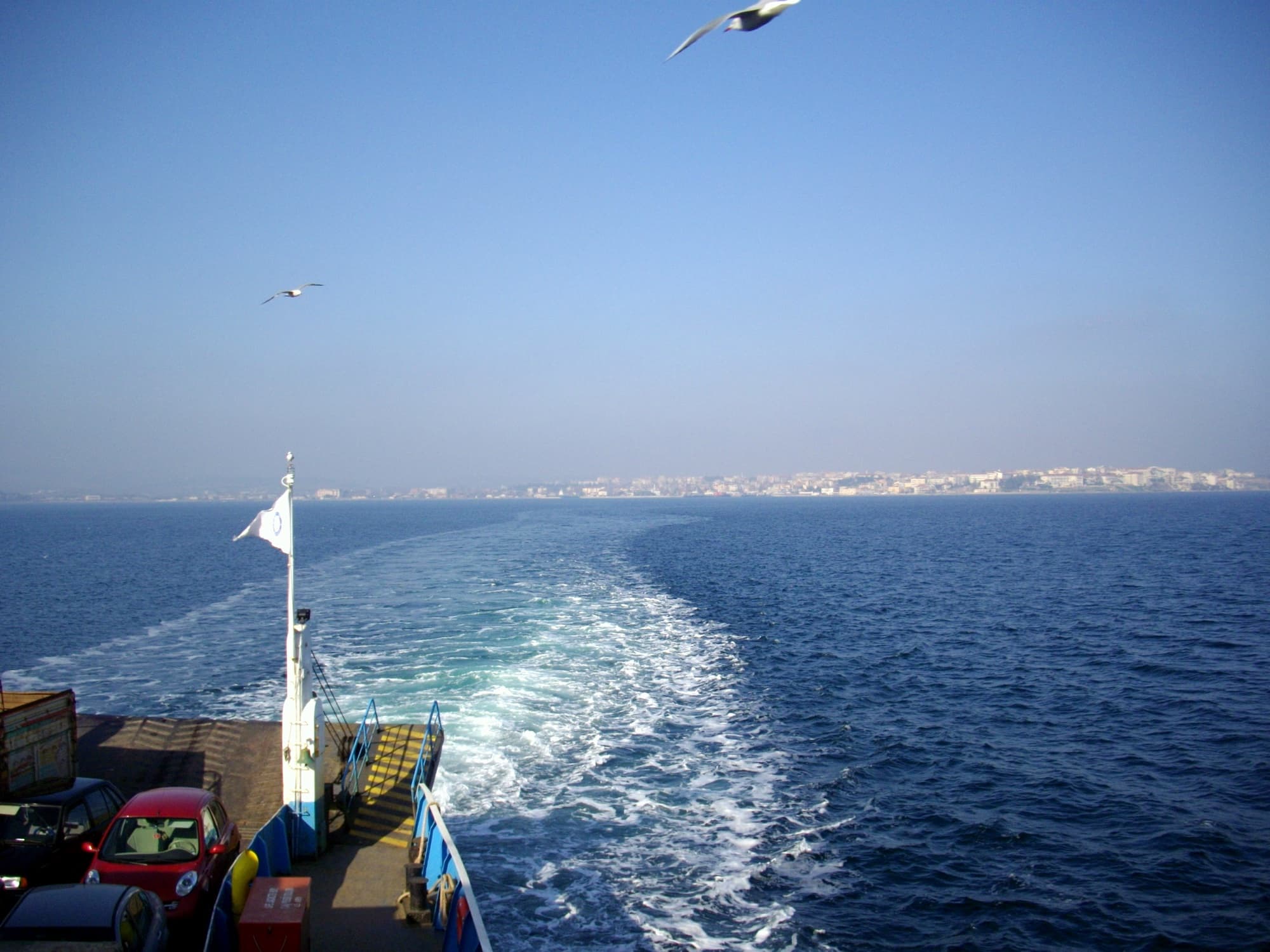 The Dardanelles, the old Hellespont, seen from the stern of a ferry crossing between Europe and Asia.