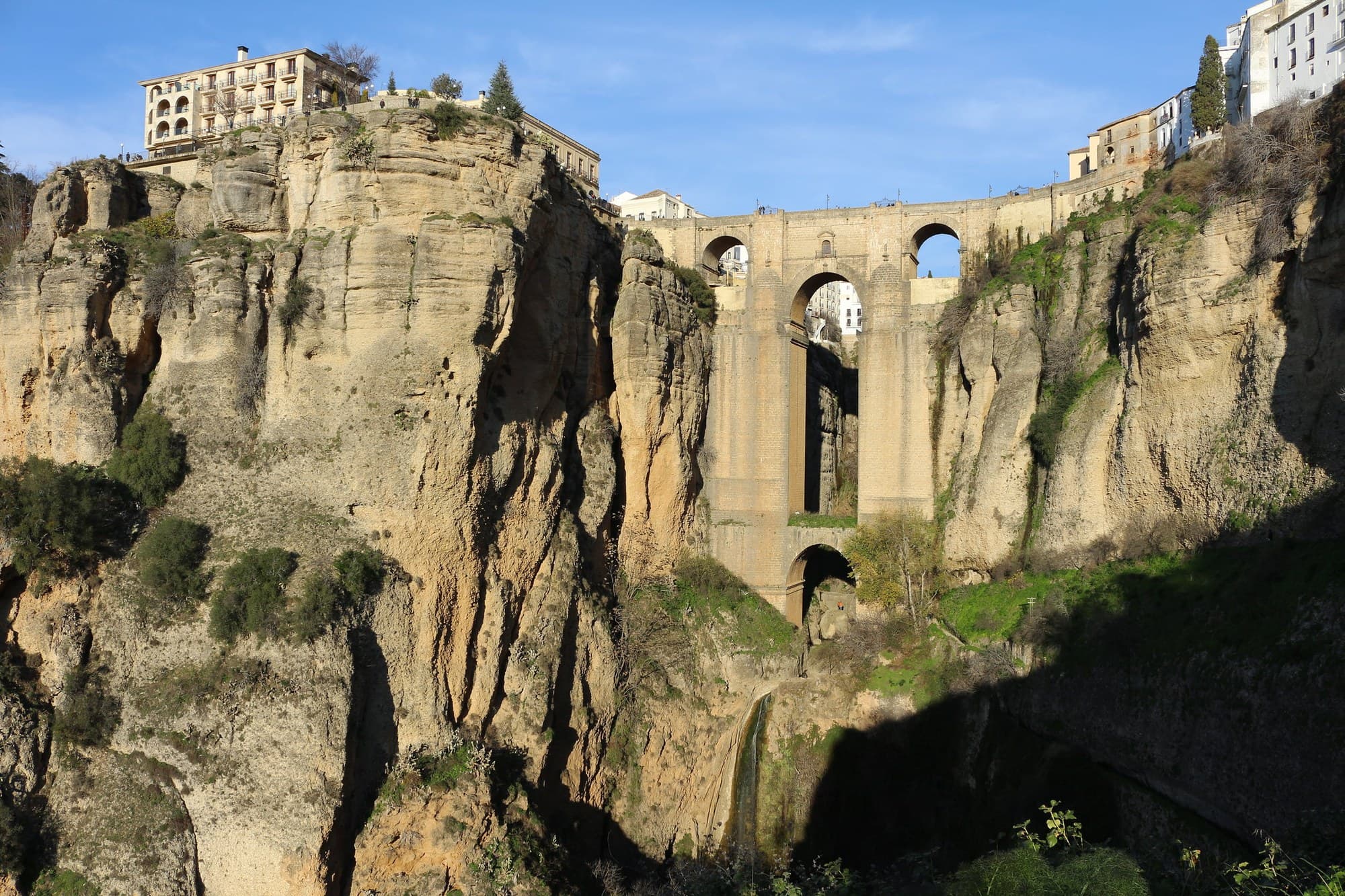 The gorge at Ronda, Spain, with the Puente Nuevo bridge between the cliffs.