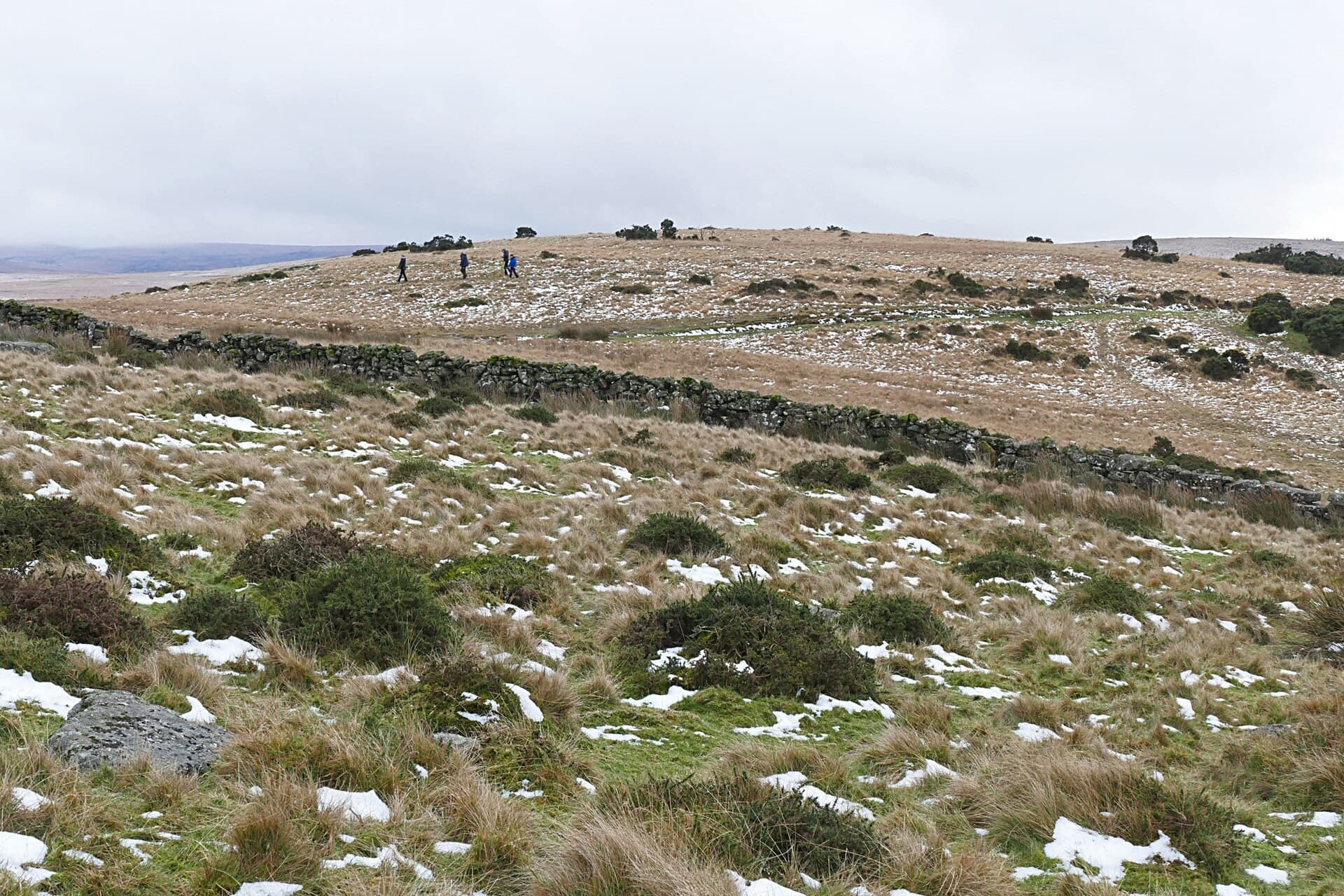 Open Dartmoor moorland near Crockern Tor in winter, patches of snow.
