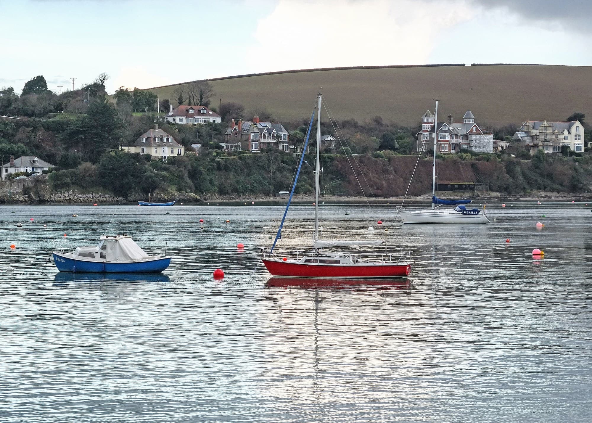 Sailing boats at anchor in Falmouth harbour, Cornwall.